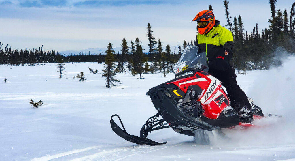 Book a guided snowmobile tour in Alaska with Alaska Adventure Guides